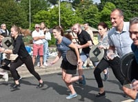 VIDEO: Ben-the-barman shakes up the waiter and waitress race at the Dartmouth Regatta