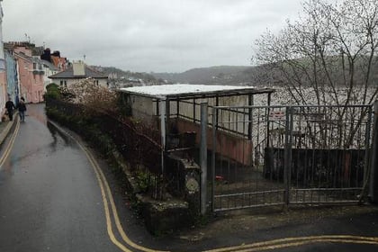 A developer is considering putting 13 two-bedroom dwellings and car parking for 26 cars on an urban waterfront site on the Dart