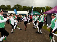 The Morris men are out and dancing all about 