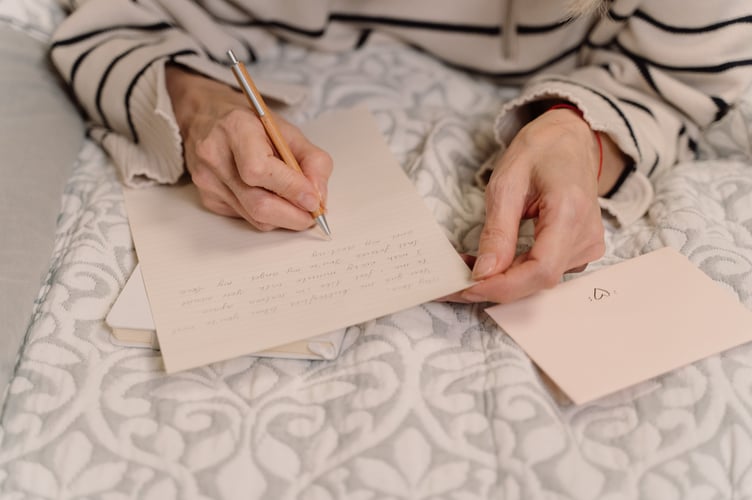 woman writing letter