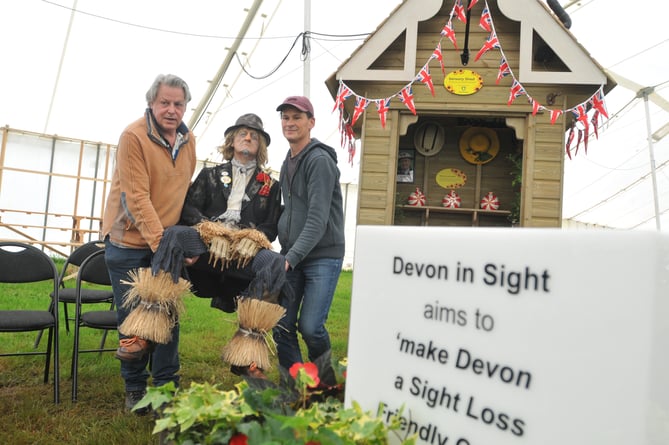 Devon County Show. Wurzel Gummidge arrives at the Devon Sight sensory garden with Grahame Flynn and Stuart Barker