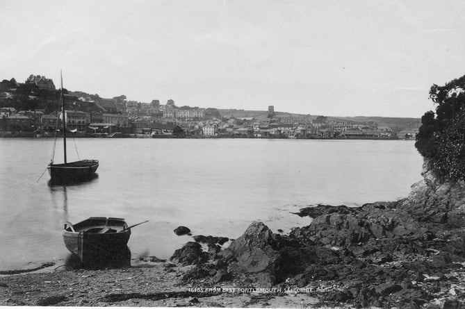 Salcombe from East Portlemouth. Two small boats in foreground.