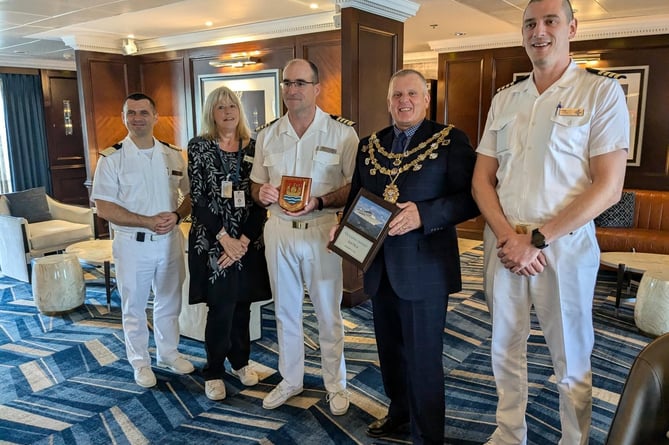 Dartmouth Mayor Cllr David Wells is welcomed aboard the Oceana Nautica 