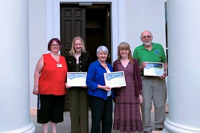 Last year's winners posing together for a group shot 