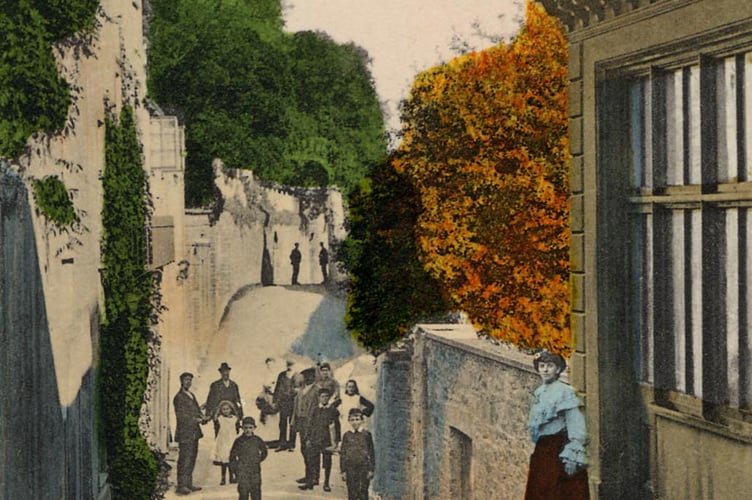 Around 1900  Cliff Road, Salcombe, at Baker's Well, view from the southern end. Cliff House is at rear left. Children standing in road, young lady in doorway of house on right, which is now part of Salcombe Harbour